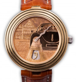 Zegarek firmy Greiner, model Taktlos Springende Stunde "Zahlenkreis" Gold
